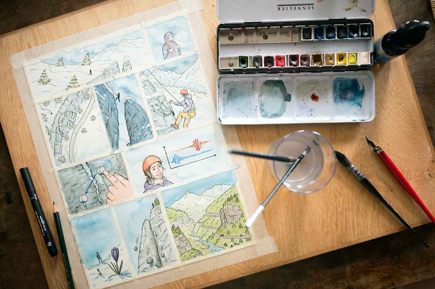 Planche de BD et palette d’aquarelle.